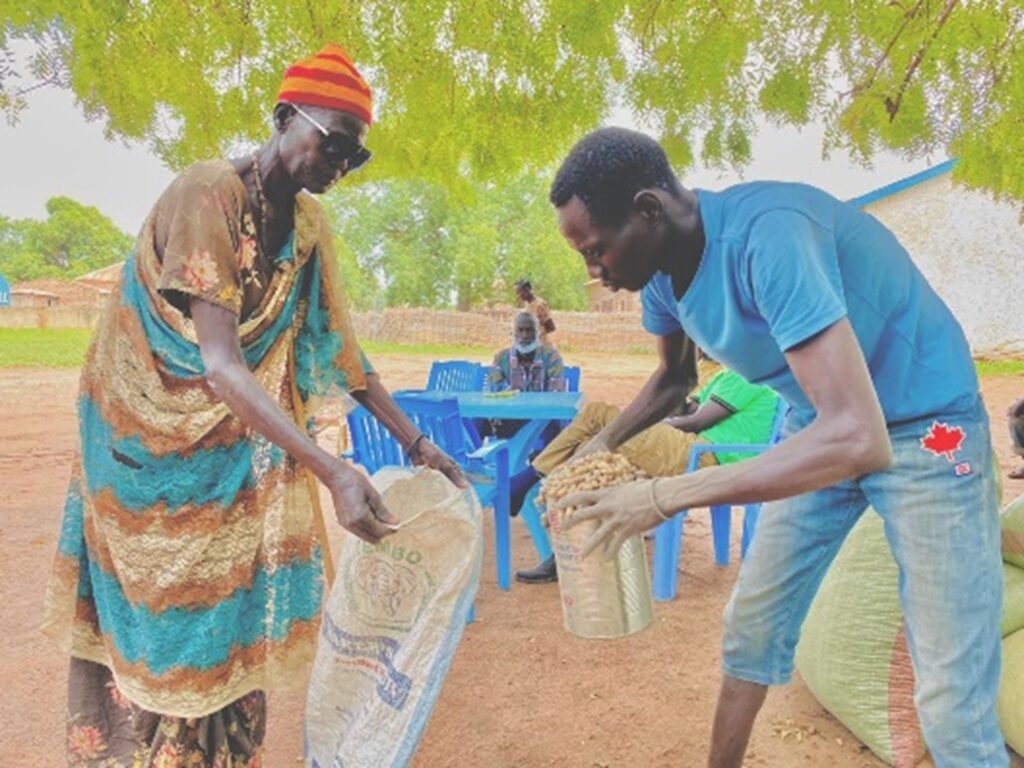 People handing out beans